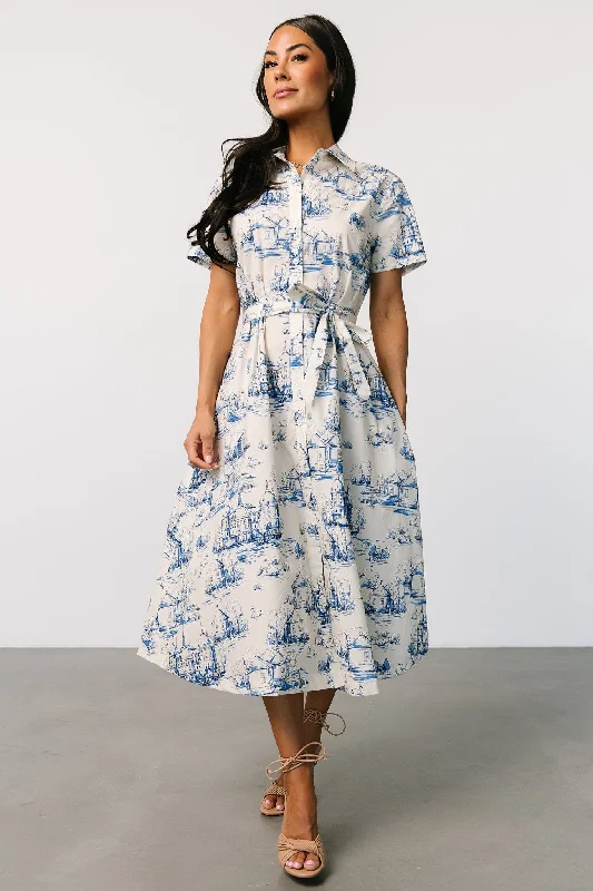 Velvet midi dresses in jewel tones for a glamorous winter event Layne Midi Dress | Cream + Blue Velvet midi dresses in jewel tones for a glamorous winter event Layne Midi Dress | Cream + Blue
