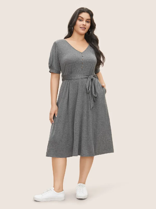Velvet midi dresses in jewel tones for a glamorous winter event Plain Button Detail Lantern Sleeve Belted Dress Velvet midi dresses in jewel tones for a glamorous winter event Plain Button Detail Lantern Sleeve Belted Dress