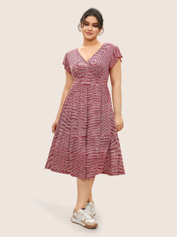 Midi dresses with puff sleeves for a vintage - inspired look Striped Surplice Neck Ruffle Cap Sleeve Dress Midi dresses with puff sleeves for a vintage - inspired look Striped Surplice Neck Ruffle Cap Sleeve Dress