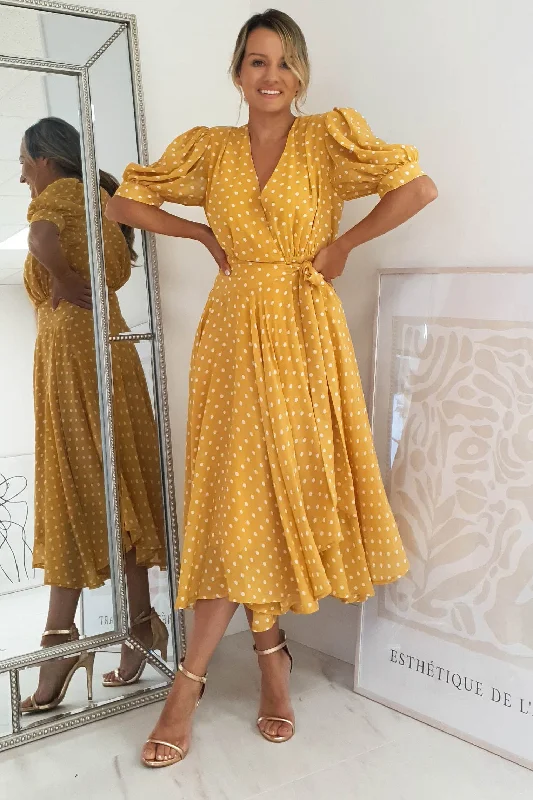 Midi dresses with keyhole backs for a flirty and unexpected detail Andrea Polka Dot Midi Dress | Mustard Midi dresses with keyhole backs for a flirty and unexpected detail Andrea Polka Dot Midi Dress | Mustard
