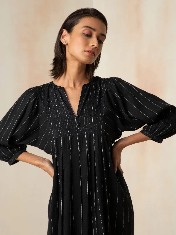Plaid midi dresses for a fall - themed family gathering Parisian Dream Pleat Dress
