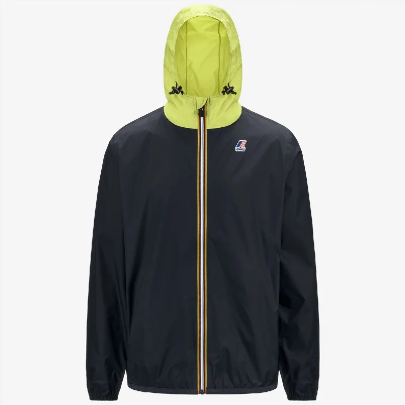 Women's quilted puffer jackets in a cropped silhouette for a modern twistClaude - Unisex Packable Full Zip Waterproof Rain Jacket in Blue Depth - Green Celery Women's quilted puffer jackets in a cropped silhouette for a modern twistClaude - Unisex Packable Full Zip Waterproof Rain Jacket in Blue Depth - Green Celery