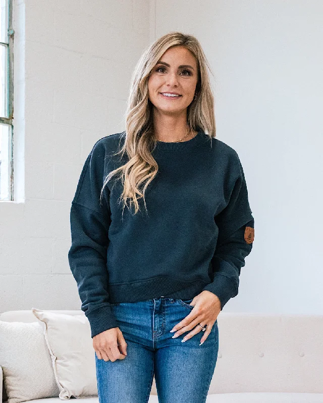 Women's long - sleeve cropped sweatshirt with ribbed cuffs for a snug fitWanakome Emmy Sweatshirt - Midnight FINAL SALE Women's long - sleeve cropped sweatshirt with ribbed cuffs for a snug fitWanakome Emmy Sweatshirt - Midnight FINAL SALE