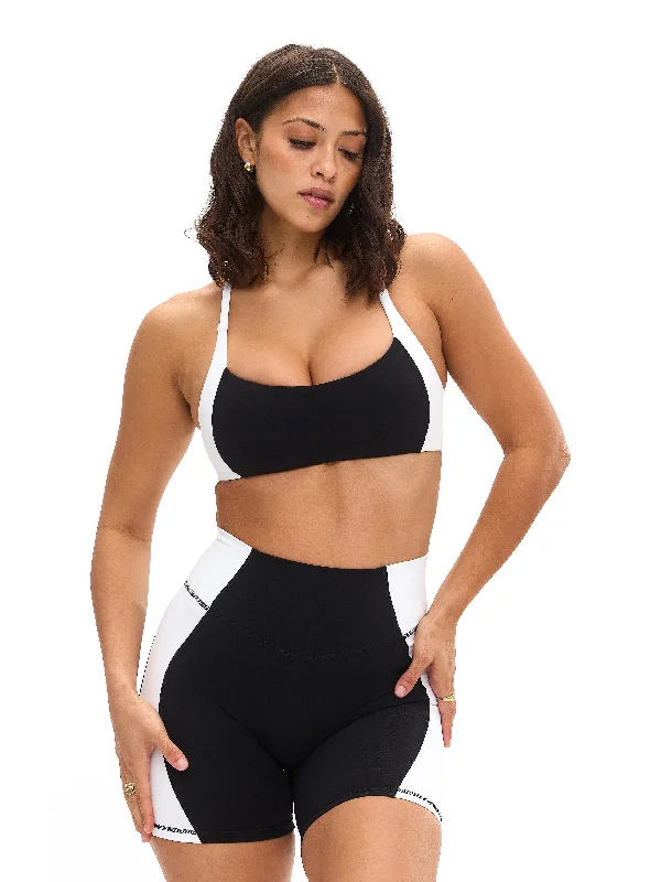 petite adjustable strap women sport braAurora Sports Bra - Onyx Black and White