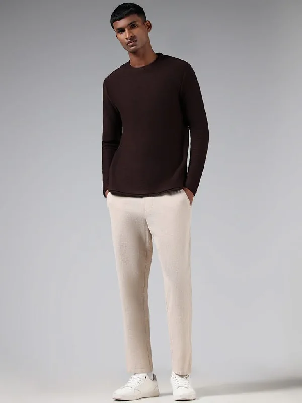 Women's pants with wrinkle - resistant material Cargo women jeans with multiple pockets for added functionality ETA Beige Self-Patterned Cotton Relaxed-Fit Mid-Rise Chinos Women's pants with wrinkle - resistant material Cargo women jeans with multiple pockets for added functionality ETA Beige Self-Patterned Cotton Relaxed-Fit Mid-Rise Chinos