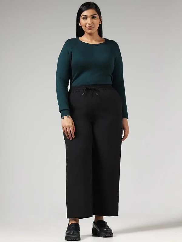 Women's two - piece pant set Ripped women jeans for a rebellious and fashion - forward style Gia Solid Black Mid Rise Wide Leg Trousers Women's two - piece pant set Ripped women jeans for a rebellious and fashion - forward style Gia Solid Black Mid Rise Wide Leg Trousers