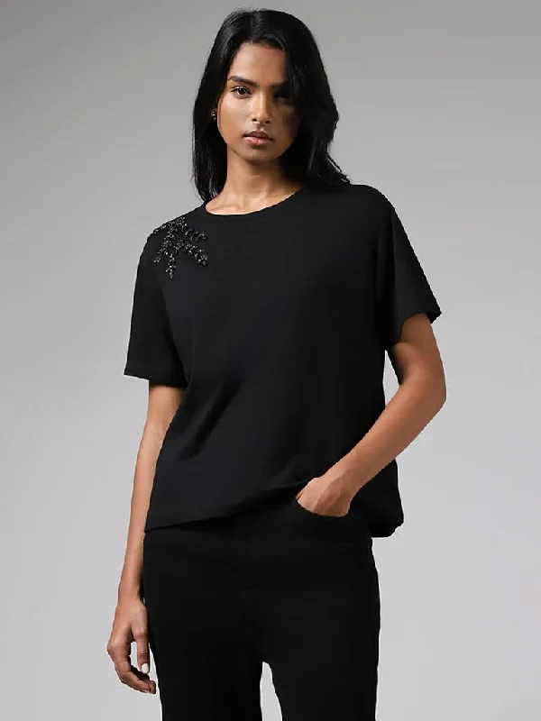 Women's pants for cocktail parties Distressed women jeans for a trendy and edgy look LOV Black Sequin Embellished Cotton T-Shirt Women's pants for cocktail parties Distressed women jeans for a trendy and edgy look LOV Black Sequin Embellished Cotton T-Shirt
