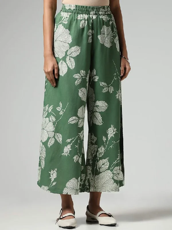 Women's two - piece pant set Ripped women jeans for a rebellious and fashion - forward style Utsa Green Bold Floral Printed Palazzos