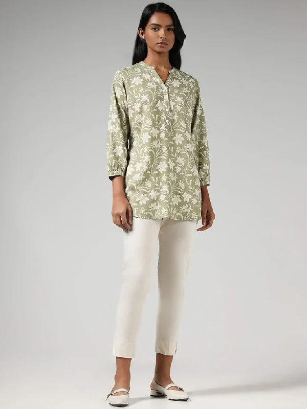 Women's pants with quick - dry fabric Button - fly women jeans with a traditional touch Utsa Green Floral Printed Tunic Women's pants with quick - dry fabric Button - fly women jeans with a traditional touch Utsa Green Floral Printed Tunic