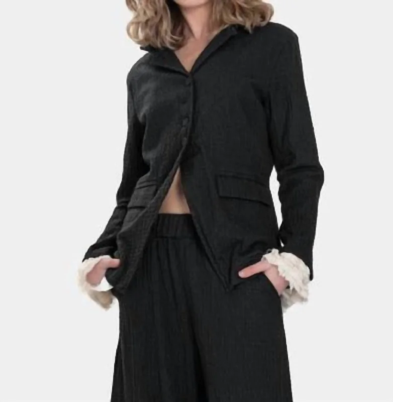 Petite women's wool blend coats with a tailored fit for a flattering silhouetteEmbossed Jacket With Ruffles In Black Petite women's wool blend coats with a tailored fit for a flattering silhouetteEmbossed Jacket With Ruffles In Black