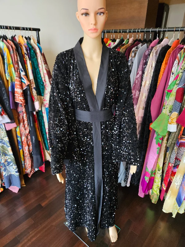 women robes with beaded accents for glamourMelody black sequin abaya